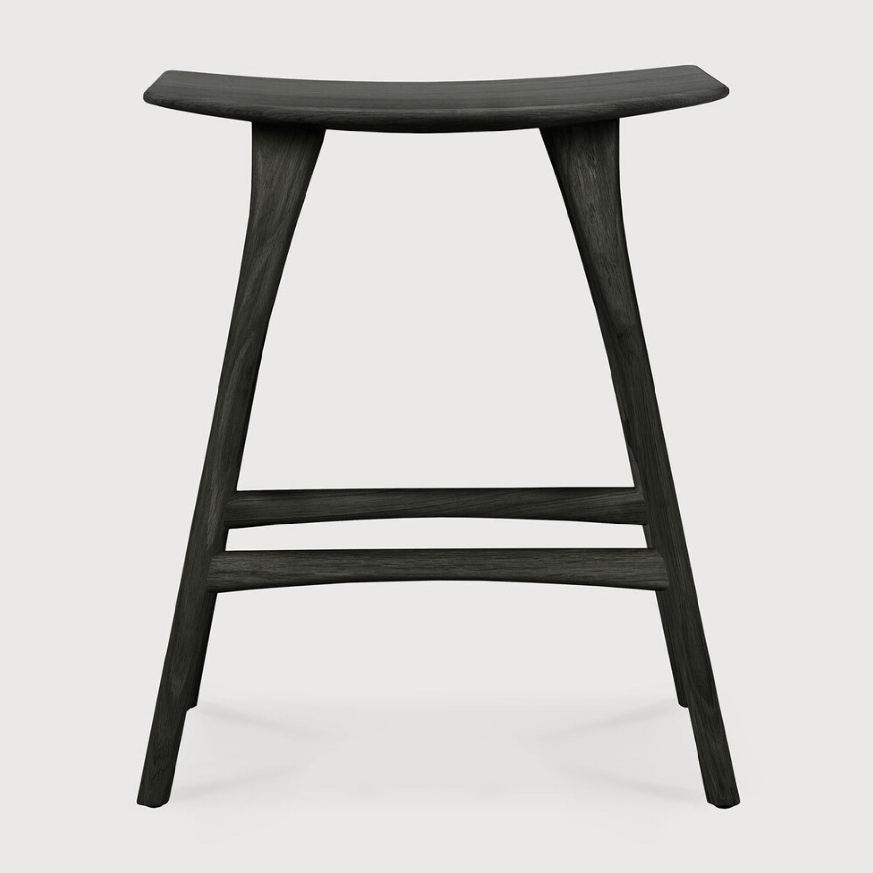 We love the versatility of this Oak Osso Bar + Counter Stool - Black.  A sleek piece to add in your bar area, kitchen island, or a standing desk stool.   Bar Dimensions: 22.5"w x 13"d x 31.5"h Seat Height: 30.5"  Counter Dimensions: 22.5"w x 14.5"d x 24.5"h Seat Height: 23"  Material: Oak, 100% Solid Wood Finish: Varnished