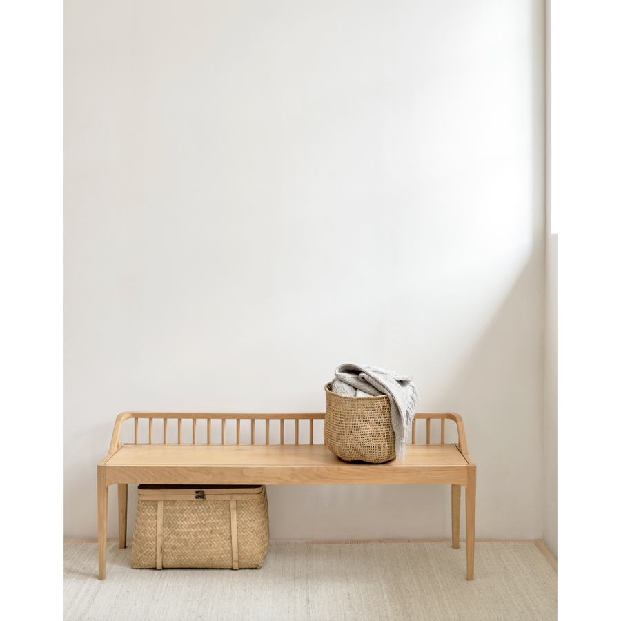 Wherever you choose to place it, this Oak Spindle Bench in solid oak is a striking piece. We'd love to see this styled with an Amethyst Pillow in your entryway, bedroom, or other space!   Dimensions: 59.5"w x 14"d x 24"h  Seat Height: 18" Weight: 28 lbs  Material: Oak, 100% Solid Wood Finish: Oiled