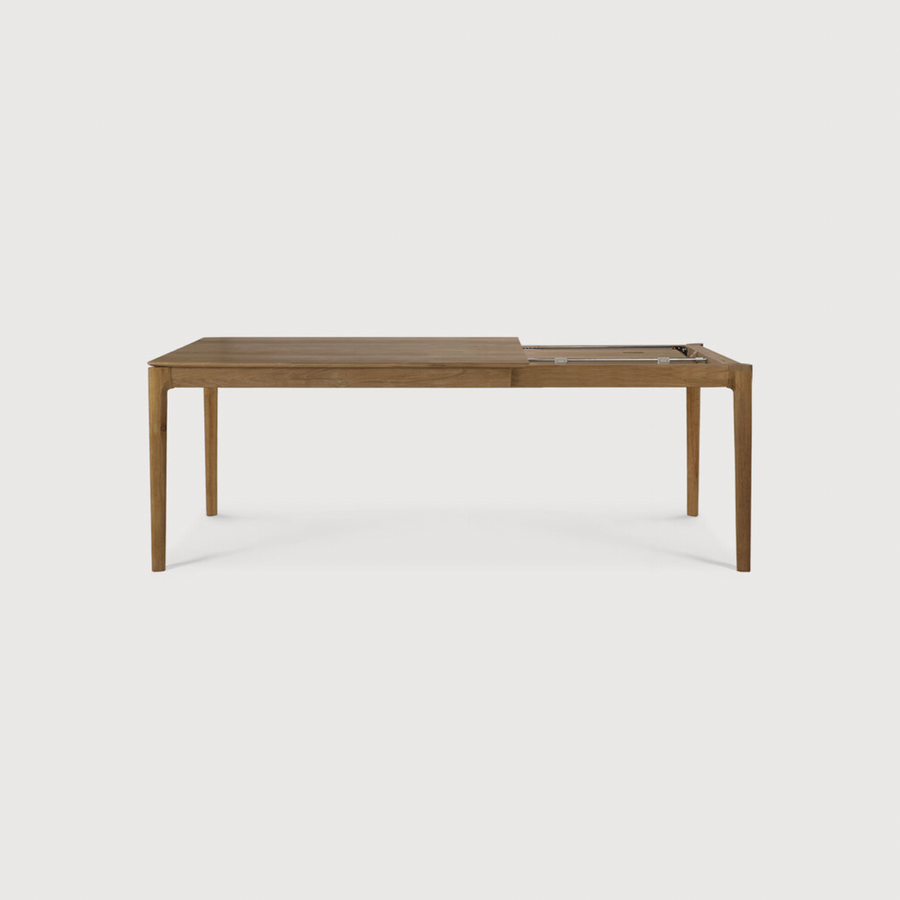 This Oak Bok Extendable Dining Table is perfect for families who want extra space when their kids, extended family, or guests come to celebrate! Its airy shape yet rock solid construction make this piece a timeless and remarkable design to enjoy for years to come.  Material: Oak, 100% Solid Wood Finish: Oiled