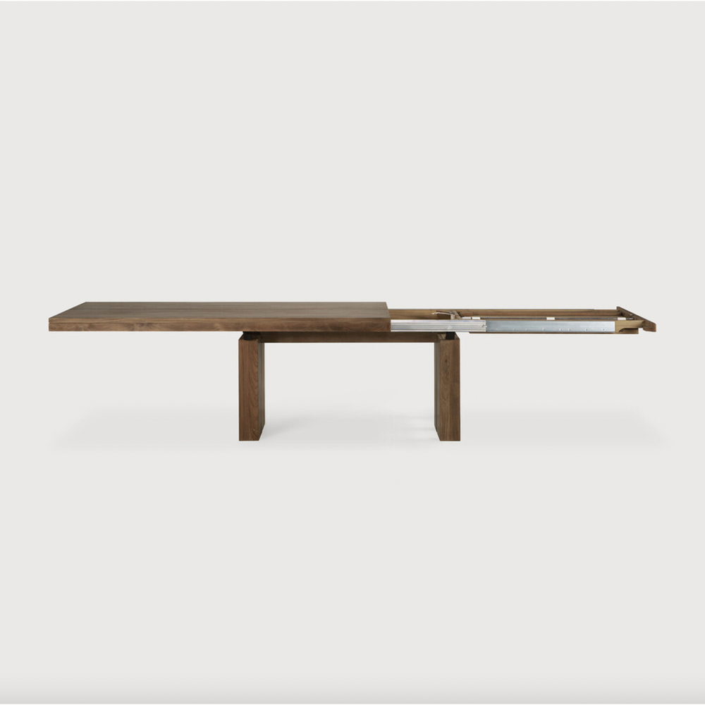 Featuring Teak Double Extendable Dining Table by Ethnicraft at Amethyst Home. We love the solid look and pure lines of this Teak Double Extendable Dining Table.  Although the table looks heavy, it can very easily be extended single-handedly. It takes a few steps and no more than seconds to make space for whatever will be happening next in your home!
Materi.  Amethyst Home provides interior design, new home construction design consulting, vintage area rugs, and lighting in the Charlotte metro area.