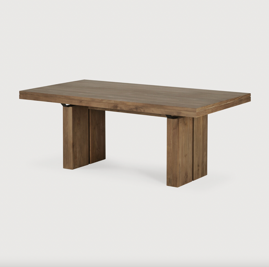 We love the solid look and pure lines of this Teak Double Extendable Dining Table.  Although the table looks heavy, it can very easily be extended single-handedly. It takes a few steps and no more than seconds to make space for whatever will be happening next in your home!  Material: Teak 