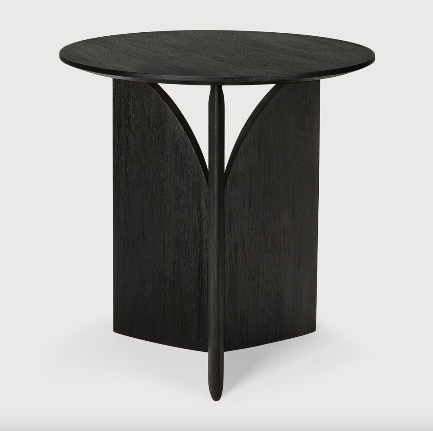 The Teak Fin Side Table is a favorite! It looks like different sculptures from every angle. We love seeing this table as a sculptural accent to your living space or office. It could even make a beautiful nightstand!   Designed by Alain van Havre  Dimensions: 20"w x 20"d x 20"h  Weight: 13 lbs  Material: Teak Finish: Varnished