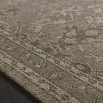 Bring a touch of antiqued beauty into your home with the Heirloom Fog / Fog Area rug from Loloi. This wool rug tastefully honors the art of hand knotted rugs. The rug evokes a sense of unique sophistication with its traditional Serapi rug color palettes and vintage design.  This rug would be perfect for a living room, dining room, bedroom, hallway or kitchen runner with it's patterns and calming tones for your home.  Hand Knotted 83% Wool | 17% Cotton HQ-03 Fog / Fog