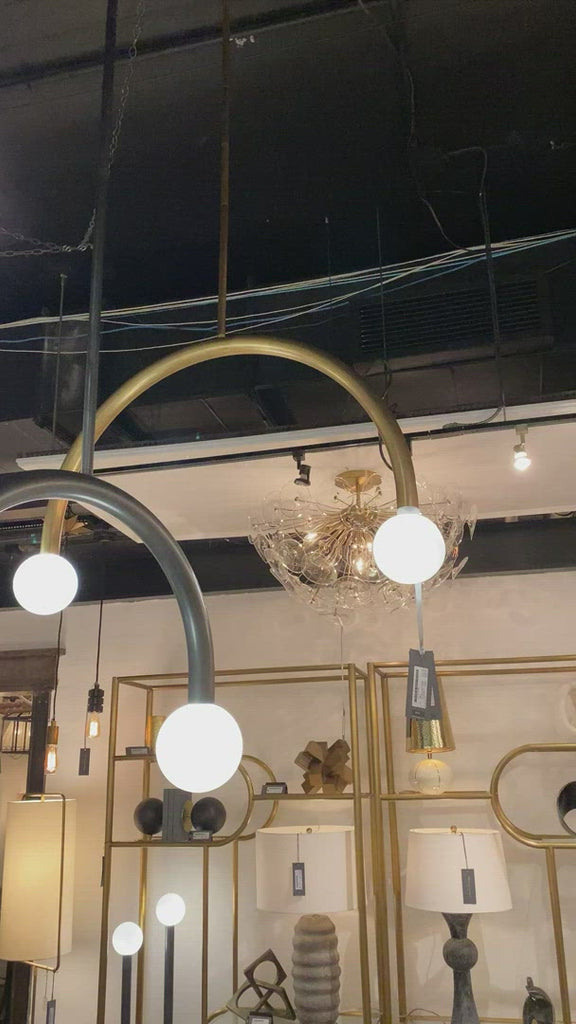We love the unique, symmetrical shape of this Happy Pendant Large by Regina Andrews. This adds a modern yet playful lighting to any kitchen, living room, or other area needing extra warmth.