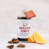 Our Mulling Syrup is essentially the holiday season in a bottle. It contains cinnamon, cloves, allspice, orange zest, and Cape Cod cranberries. This syrup is intended for mixing with wine to make a wonderful mulled wine -- or with apple cider for a classic cold-weather beverage. Amethyst Home provides interior design services, furniture, rugs, and lighting in the Dallas metro area.