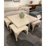 Meet a forward-thinking oak coffee table as stylish as it is functional with this Amara Coffee Table. We love the beautifully arched sides with four separate nesting tables that slide out to create ample extra surfaces as needed, tucking back under with ease.  Overall Dimensions: 47.25"w x 47.25"d x 18.00"h