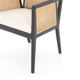 We loved the retro look of this Antonia Cane Dining Armchair - Brushed Ebony. The brushed ebony nettlewood frames paired with the natural cane brings the perfect contract to any dining room or kitchen area.   Overall Dimensions: 22.75"w x 23.50"d x 33.00"h