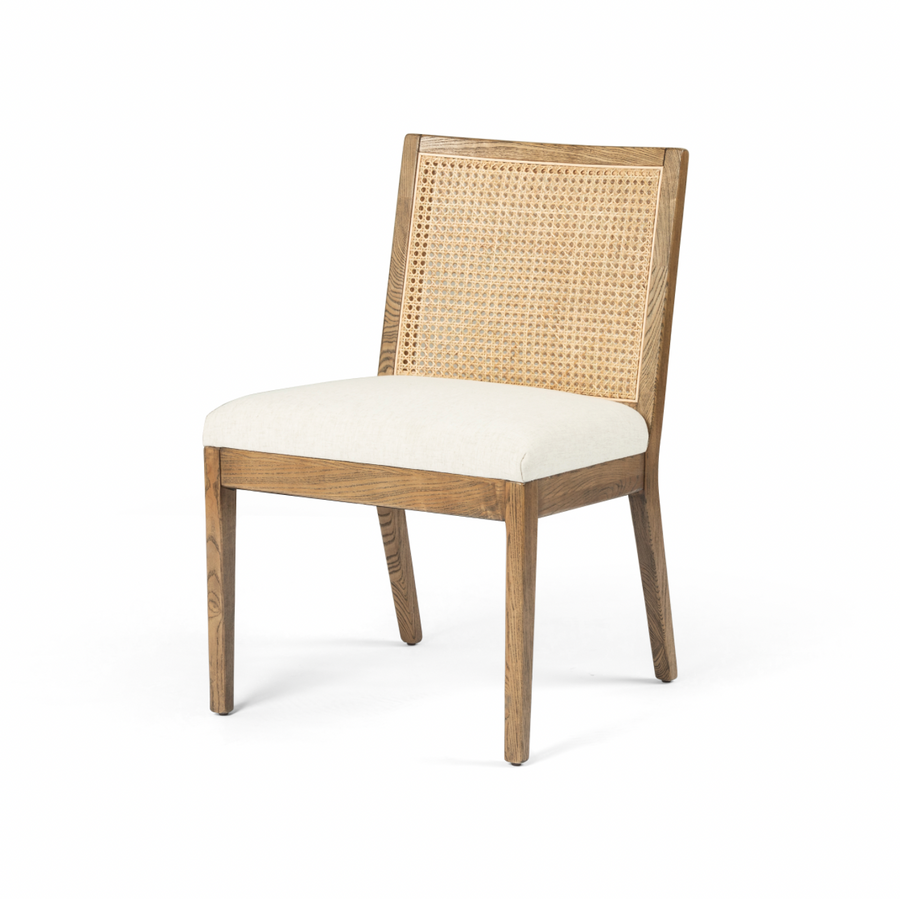 The love the retro style the natural cane of this Antonia Cane Toasted Nettlewood Armless Dining Chair brings to a dining room.   Overall Dimensions: 22.50"w x 23.50"d x 33.00"h Seat Depth: 19.25" Seat Height: 19.5"  Colors: Natural Cane, Toasted Nettlewood, Savile Flax Materials: Cane, Solid Nettlewood, 92% Pl, 8% Li