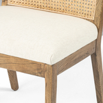 The love the retro style the natural cane of this Antonia Cane Toasted Nettlewood Armless Dining Chair brings to a dining room.   Overall Dimensions: 22.50"w x 23.50"d x 33.00"h Seat Depth: 19.25" Seat Height: 19.5"  Colors: Natural Cane, Toasted Nettlewood, Savile Flax Materials: Cane, Solid Nettlewood, 92% Pl, 8% Li