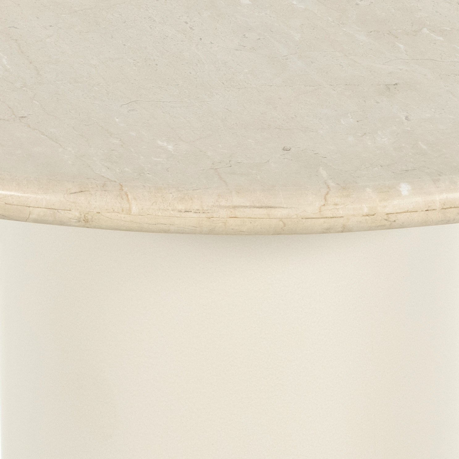 Simply sophisticated with this Belle Round Dining Table - Cream Marble. This bistro-style table inspired by 1970s Italian design features an ivory-finished iron base and supports a rounded tabletop of cream-colored solid marble for a fresh, monochromatic look that pairs with just about anything.  Overall Dimensions: 38.00"w x 38.00"d x 30.00"h