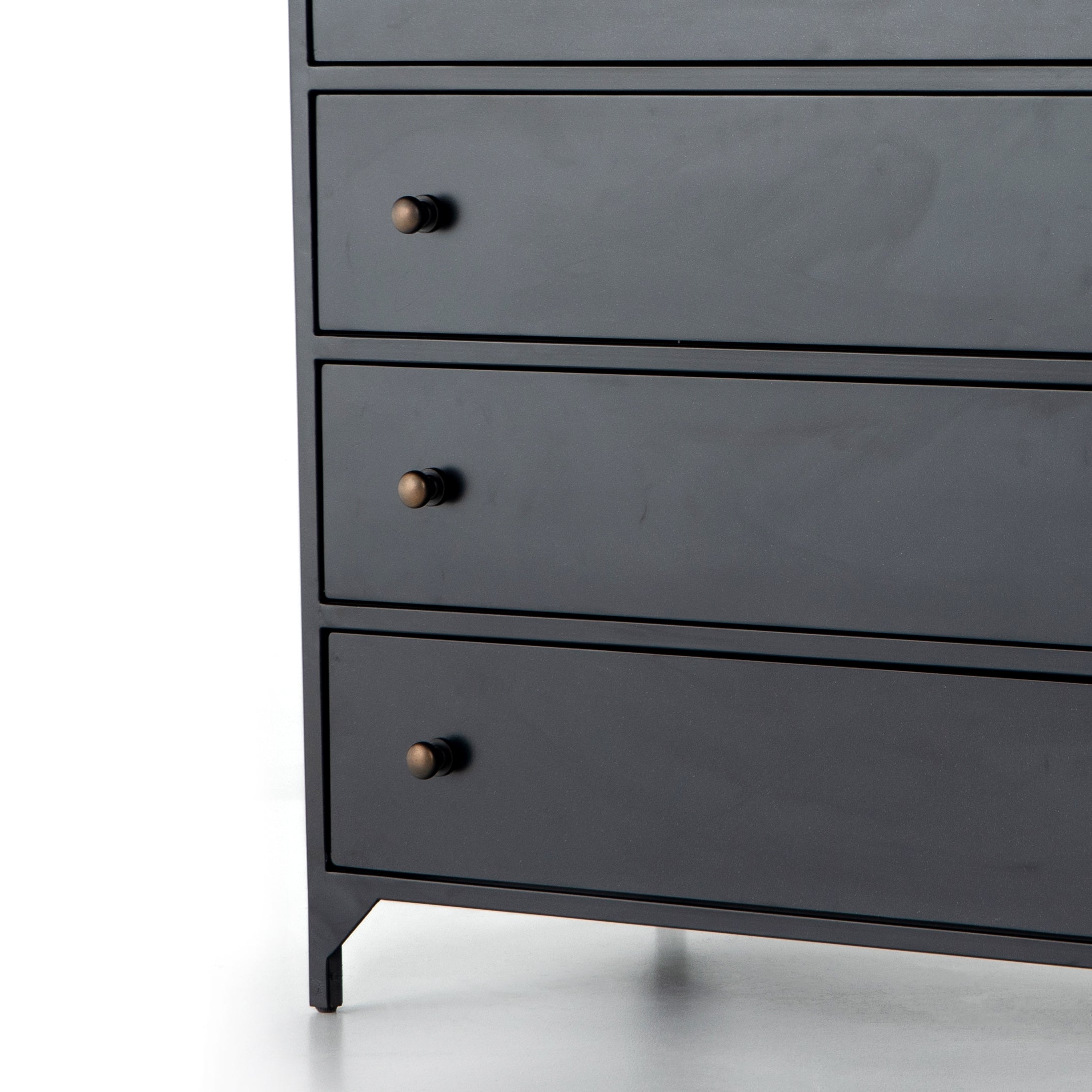 Sleek and industrial-inspired, this Belmont 8 Drawer Tall Dresser has black iron that forms a tall, spacious eight-drawers dresser. The brass knobs bring a cool contrast to any bedroom.   Overall Dimensions: 35.50
