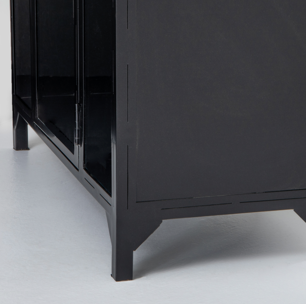 Display barware, books, or other treasures in an arch-topped cabinet. Solid iron sheeting is finished in soft, matte black with contrasting brass hardware.  Overall Dimensions: 39.50"w x 15.75"d x 92.50"h Colors: Black, Clear Glass Materials: Iron, Glass Weight: 235.89 lb