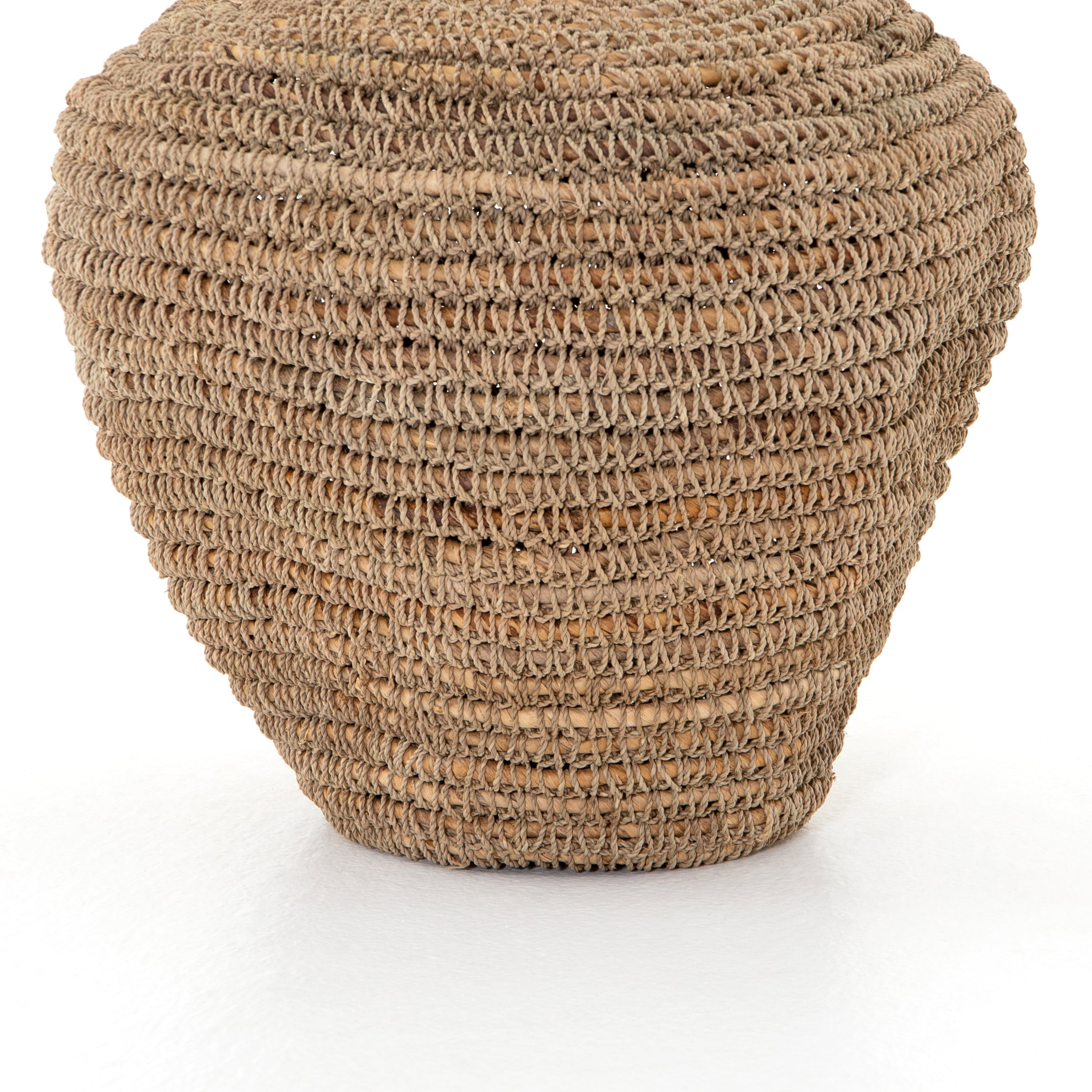 This slouched Bodhi Basket -  Natural has an iron framed wrapped in hand-woven banana leaf. Place on your shelf or in the entryway and bring all the boho vibes to the space.   Overall Dimensions: 15.75"w x 15.75"d x 19.00"h Colors: Black Ink, Natural Banana Leaf Materials: Iron, Banana Leaf
