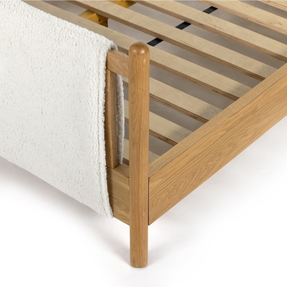 Featuring Bowen Bed by Four Hands at Amethyst Home. Bring a cozy hygge vibe to the bedroom with this textured Bowen Bed. Framed by light-finished solid oak, a sling-style bed features faux shearling head and foot boards -- sure to elevate any bedroom. 
Queen Overall Dimensions: 64.25"W x 87.25"L x 48"HKing Overall Dimensions: 80.25"W x 88.50"L x 48"H
Colors: .  Amethyst Home provides interior design, new home construction design consulting, vintage area rugs, and lighting in the Dallas metro area.