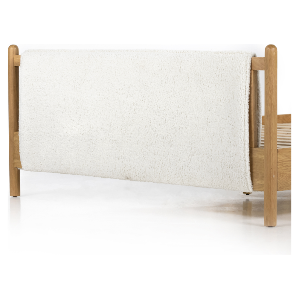 Featuring Bowen Bed by Four Hands at Amethyst Home. Bring a cozy hygge vibe to the bedroom with this textured Bowen Bed. Framed by light-finished solid oak, a sling-style bed features faux shearling head and foot boards -- sure to elevate any bedroom. 
Queen Overall Dimensions: 64.25"W x 87.25"L x 48"HKing Overall Dimensions: 80.25"W x 88.50"L x 48"H
C.  Amethyst Home provides interior design, new home construction design consulting, vintage area rugs, and lighting in the Newport Beach metro area.