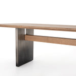 This Brennan Dining Table - Dove Oak has a rectangular soft-grey oak tabletop and flaunts its materials' natural graining, for a richly organic takeaway. Wide, plank-style legs of pewter-finished steel features an ombre pattern -- a statement piece for any dining room or kitchen area.   Overall Dimensions: 94.00"w x 42.00"d x 30.00"h