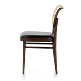 Inspired by the Thonet chair popularized in the mid-century, this Court Dining Chair - Noir features dark, solid ash and forms a simple-but-shapely frame for black polyfoam seating and a natural cane back.  Overall Dimensions: 17.75"w x 21.25"d x 31.75"h
