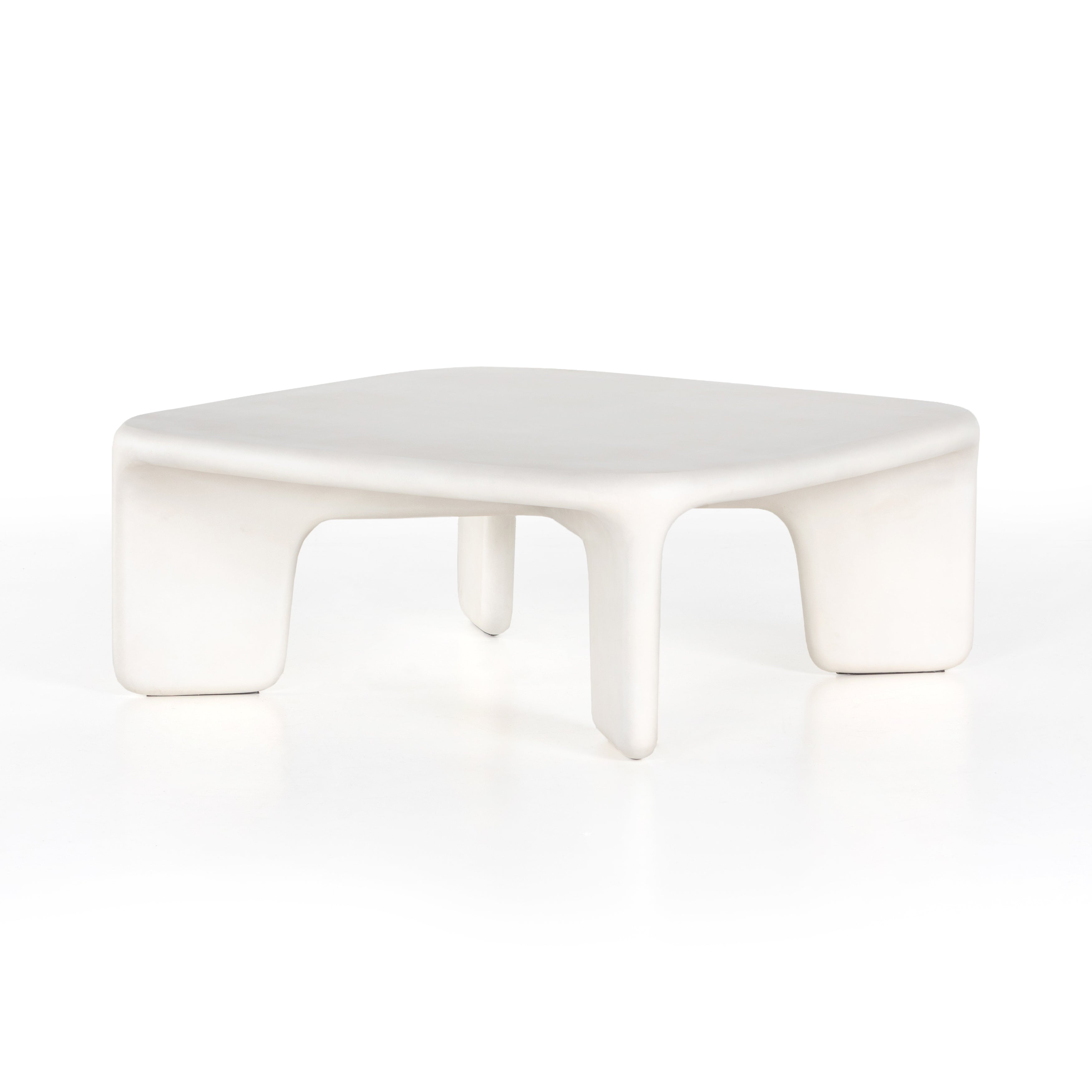 A minimalist dream, this Dante Coffee Table - White Concrete is made from white-finished cast concrete with soft, chunky proportions. This would elevate the space for any living room or lounge area.    Overall Dimensions: 42.00"w x 42.00"d x 16.00"h