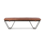 The Darrow Bench -  Palermo Cognac is a time-honored bench, reinvented. With fresh, clever shaping, angular gunmetal-finished iron supports spare-yet-comfortable top-grain leather cushioning in a rich cognac.  Overall Dimensions: 63.50"w x 17.50"d x 17.75"h