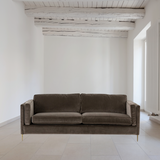 Featuring Emery Sofa - Sapphire Birch by Four Hands at Amethyst Home. We love the plush brich-grey upholstery of this Emery Sofa - Sapphire Birch. The slim legs are finished in a gorgeous antique brass, for a sophisticated look for any living room or lounge area. 
Overall Dimensions: 84"W x 36"L x 33"HColors: Sapphire Birch, Antique BrassMaterials: 92%Pl,.  Amethyst Home provides interior design, new home construction design consulting, vintage area rugs, and lighting in the Washington metro area.