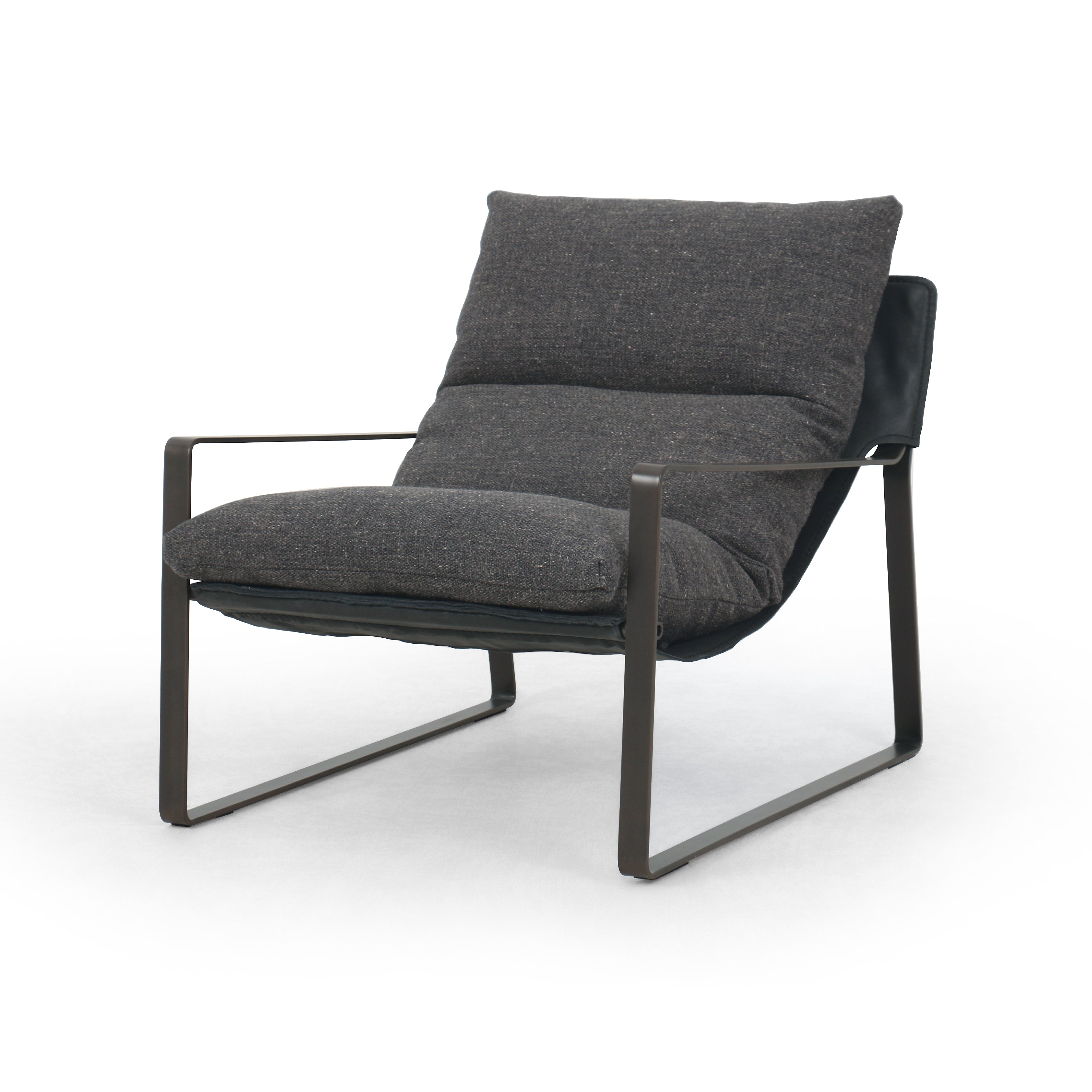 This Emmett Sling Chair - Thames Ash is super stylish and effortlessly cool. Sling-style seating of grey performance-grade upholstery exclusive to Four Hands sits low and curved for a fresh take on a throwback form. Industrial iron framing turns up the drama for any living room or office.   Overall Dimensions: 29.00"w x 36.00"d x 29.00"h Seat Depth: 20.0"