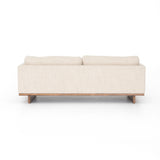 Classic goes contemporary with this Everly Sofa - Irving Taupe. A cocoa-finished parawood base supports low, deep seating of performance-grade upholstery in an invitingly neutral taupe, with track arms for a clean touch for any living room or lounge area.   Overall Dimensions: 84.00"w x 43.00"d x 32.00"h