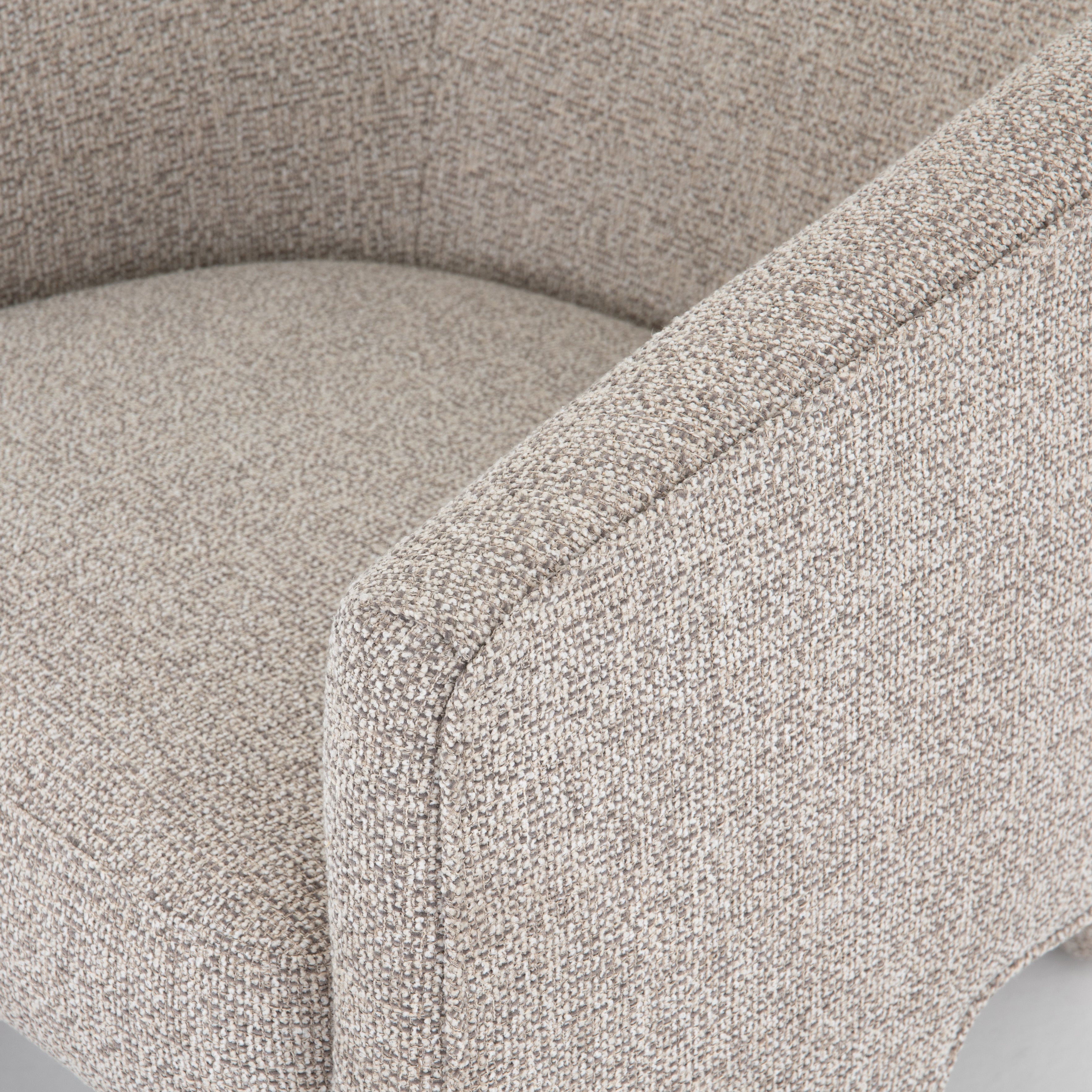 This Fae Chair - Bellamy Storm is well-tailored and stylistically unique. The Italian boucle lends a high-fashion feel to a cleverly constructed three-legged design.  Overall Dimensions: 30.25"w x 29.50"d x 29.50"h