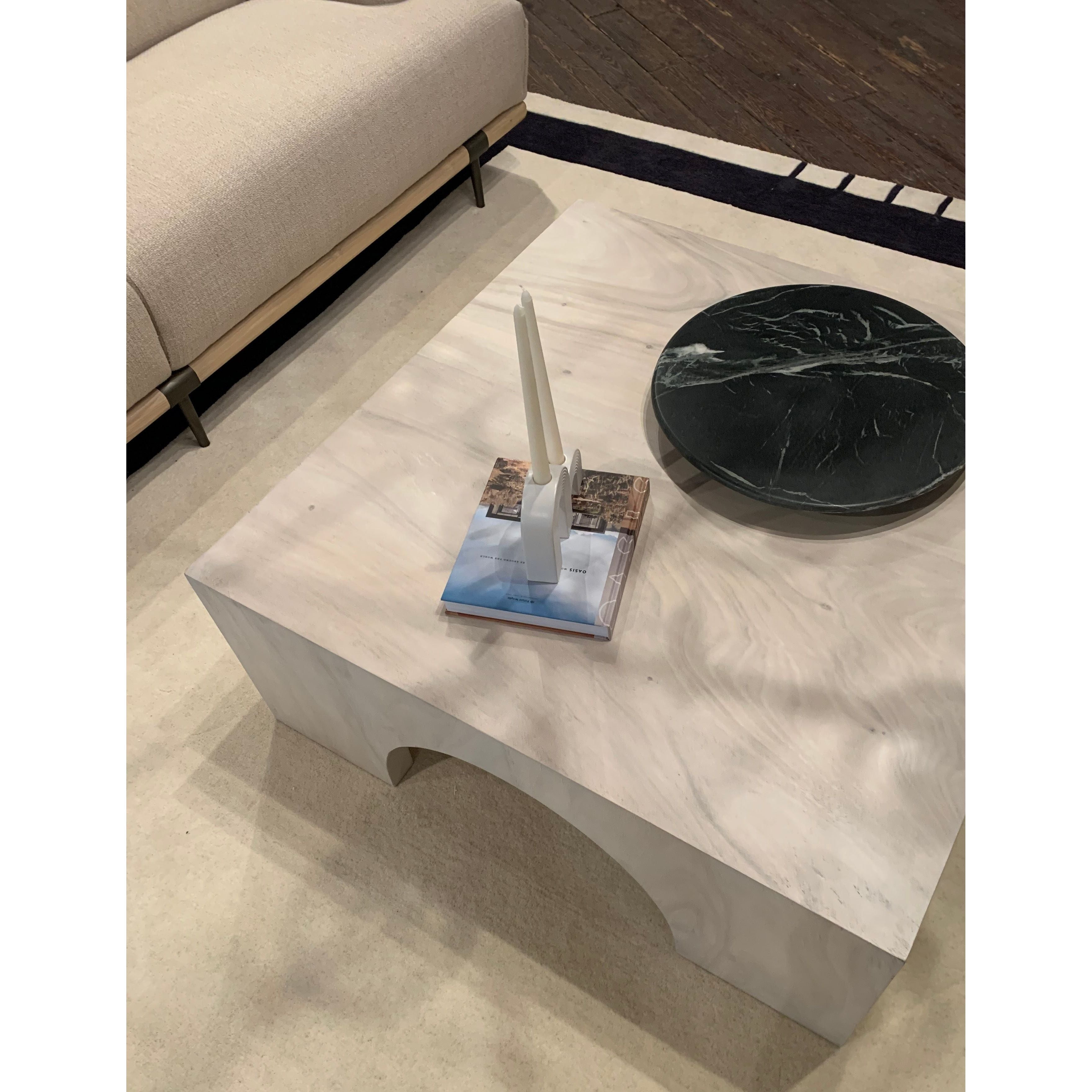 We love how clean and simple this Fausto Coffee Table -  Bleached Guanacaste is. Made from beautiful bleached Guanacaste, shapely arches and block corners speak to the architectural inspiration behind this eye-catching coffee table.  Overall Dimensions: 40.00"w x 40.00"d x 16.00"h