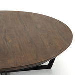 We love the raw, rustic iron base of this Felix Round Coffee Table - Light Tanner Brown. A rounded brown top of reclaimed woods, which is sandblasted for textured nuance and sophisticated polish, brings an organic feel to any living room!  Overall Dimensions: 48.00"w x 48.00"d x 15.00"h
