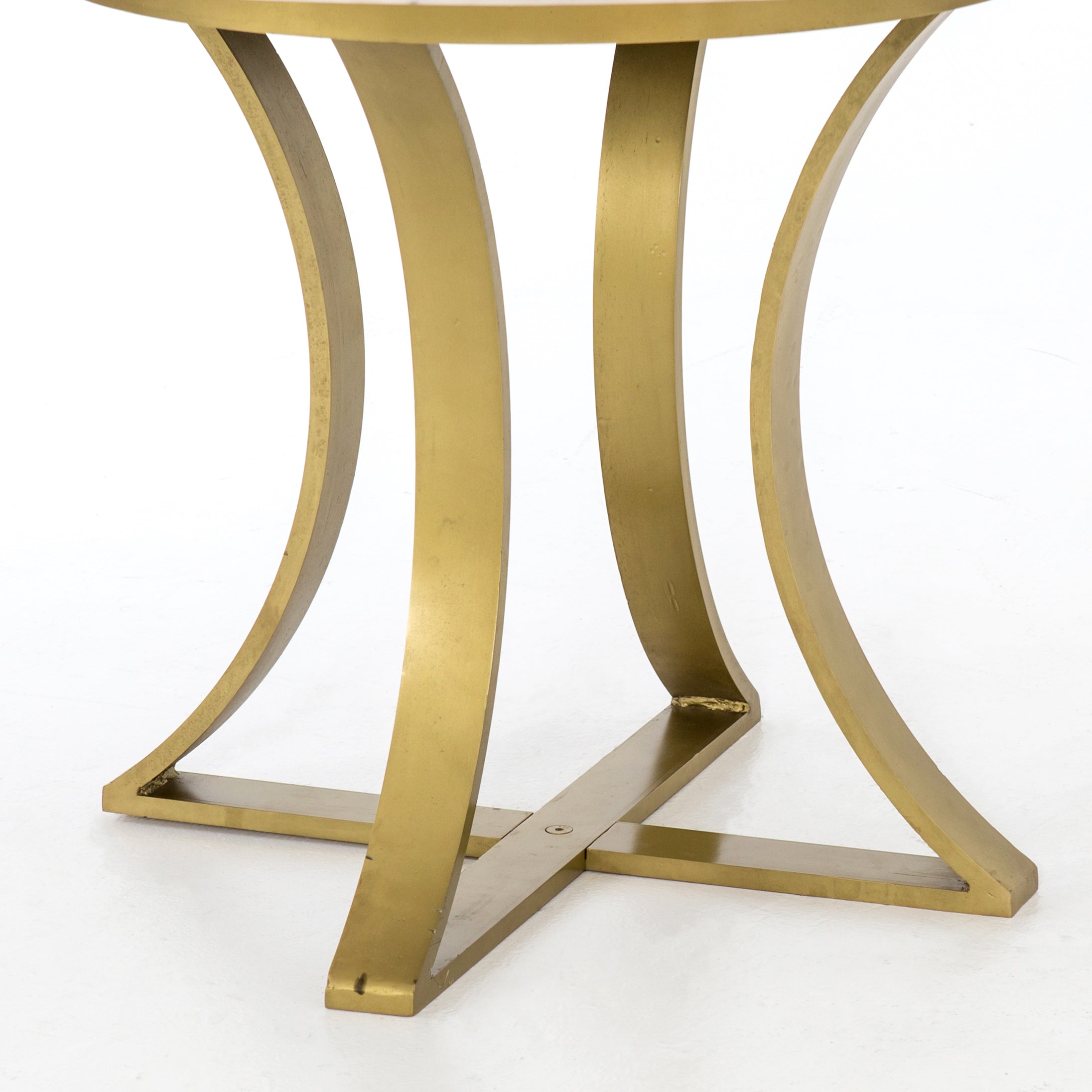 Featuring Gage Dining Table - Polished White Marble by Four Hands at Amethyst Home. Sophisticated materials take a cue from modern geometry. Cast brass iron forms uniquely-curved angles to balance a contrasting polished white marble top. A refined spin on trend-forward design.
Dimensions: 48"W x 48"L x 30"H, or 60"W x 60"L x 30"H 
Colors: Cast Brass, Polis.  Amethyst Home provides interior design, new home construction design consulting, vintage area rugs, and lighting in the Calabasas metro area.