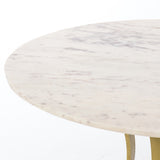Featuring Gage Dining Table - Polished White Marble by Four Hands at Amethyst Home. Sophisticated materials take a cue from modern geometry. Cast brass iron forms uniquely-curved angles to balance a contrasting polished white marble top. A refined spin on trend-forward design.
Dimensions: 48"W x 48"L x 30"H, or 60"W x 60"L x 30"H 
Colors: Cast Brass, Polish.  Amethyst Home provides interior design, new home construction design consulting, vintage area rugs, and lighting in the Portland metro area.