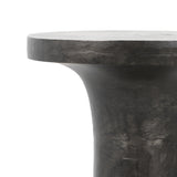 Made from raw black cast aluminum, a dramatically tapered Gino End Table - Raw Black flaunts beautiful high/ low hues and subtle Brutalist vibes. Perfect for setting your book or favorite drink next to.   Overall Dimensions: 13.00"w x 13.00"d x 20.00"h