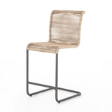 The Grover Outdoor Bar + Counter Stool has an attractive curvature that summons a sit. A slim, gunmetal-finished iron frame supports woven all-weather wicker seating in a vintage white, for a textural twist on cantilever-style bar seating. Cover or store indoors during inclement weather and when not in use.