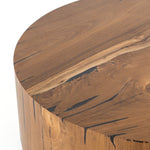We love how the stunning forces of nature are captured in the Hudson Natural Yukas Coffee Table. Natural yukas wood is hand-shaped into a cylindrical silhouette and placed over a bronzed iron base to complete your living room space.   Overall Dimensions: 40"w x 40"d x 15"h  Colors: Natural Yukas Resin, Gunmetal Materials: Thick Yukas Veneer, Iron