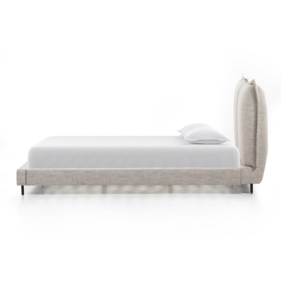 We love the plush look of this Inwood Bed. The oversized pillow-like cushioning creates the headboard for this low-profile bed, for a grand-but-cozy look in any bedroom.   Queen Overall Dimensions: 74.75"w x 95.25"d x 43.50"h King Overall Dimensions: 91.00"w x 95.25"d x 43.50"h
