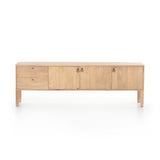 Featuring Isador Media Console - Dry Wash Poplar by Four Hands at Amethyst Home. This Isador Media Console - Dry Wash Poplar is clean, bright and dreamy. Solid dry-washed poplar forms a clean-lined media console with dovetail joinery plus iron and leather hardware, for a fresh look to any living room.
Ample shelving + rear cut outs for cord management brings.  Amethyst Home provides interior design, new home construction design consulting, vintage area rugs, and lighting in the Seattle metro area.