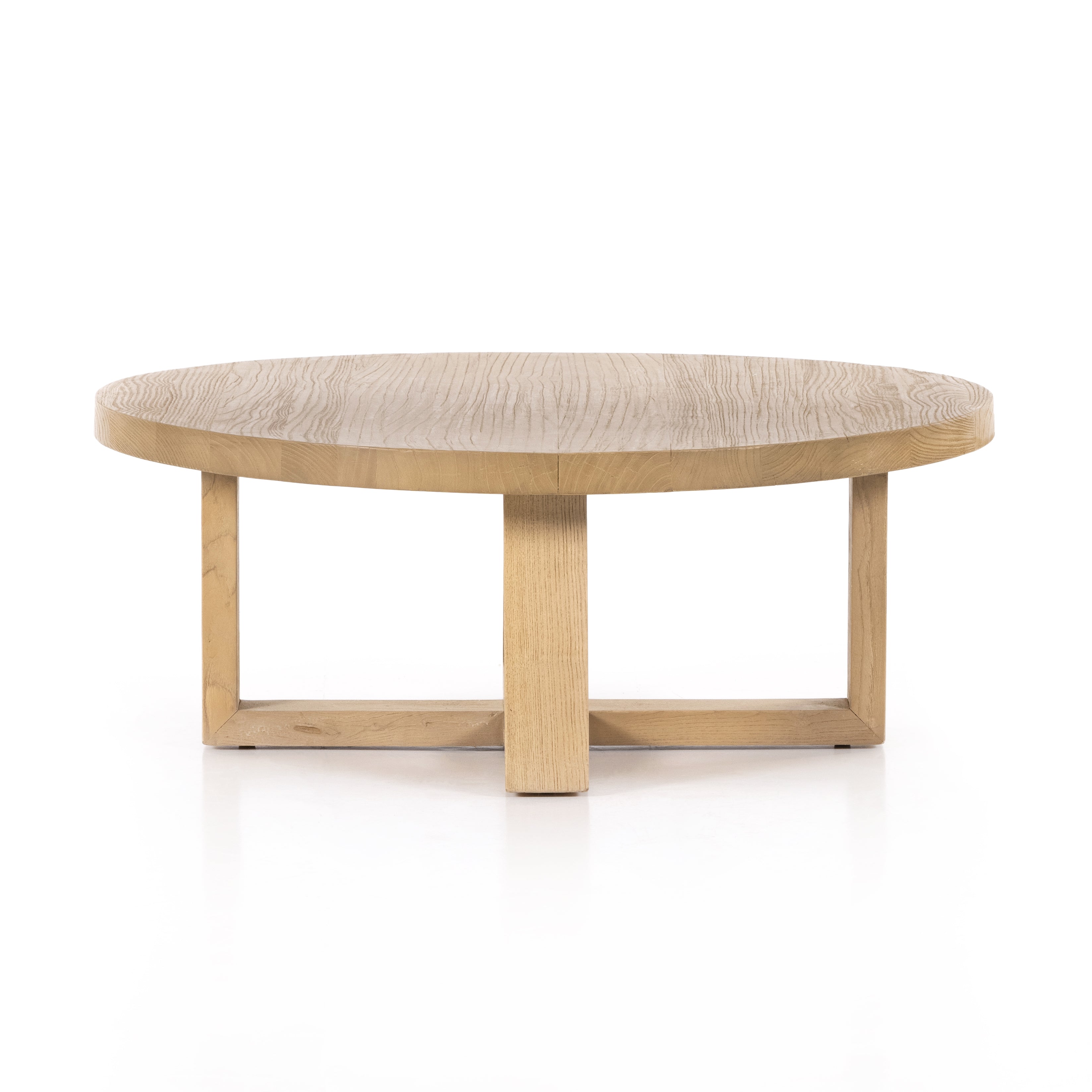 Made from solid natural nettlewood, an open cross-style base supports a thick, rounded tabletop finished with a soft hand on this Liad Coffee Table - Natural Nettlewood. We'd love to see this in your living room or lounge area!  Overall Dimensions: 39.25"w x 39.25"d x 15.00"h