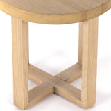 Made from solid natural nettlewood, an open cross-style base supports a thick, rounded tabletop finished with a soft hand on this Liad End Table - Natural Nettlewood. We'd love to see this in your living room or bedroom!  Overall Dimensions: 19.75"w x 19.75"d x 19.75"h