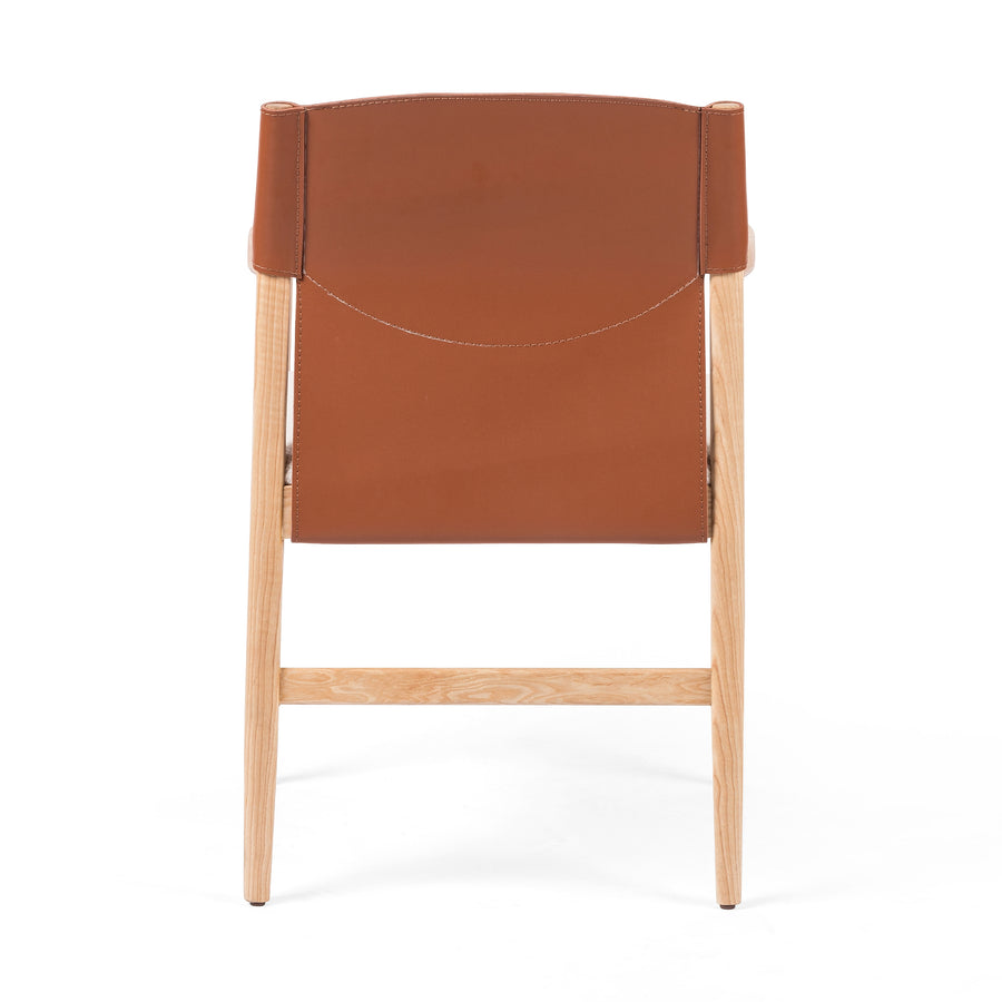 We love the combination of materials found in this Lulu Dining Chair - Saddle Leather Blend. The leather blend back, solid ash, and performance fabric seat cushion bring an elevated look to any dining room or kitchen area.   Overall Dimensions: 22.50"w x 21.75"d x 32.75"h