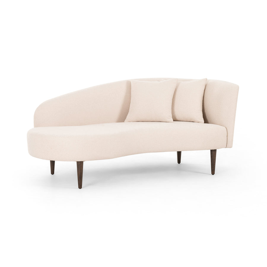 This curvy, Italian-inspired Luna Chaise exudes attitude. This features exclusive performance-grade ivory boucle in a striking, sultry S shape. Dual pillows for a fine finishing touch for any bedroom, office, or living room.  Overall Dimensions: 70.00"w x 35.00"d x 30.00"h