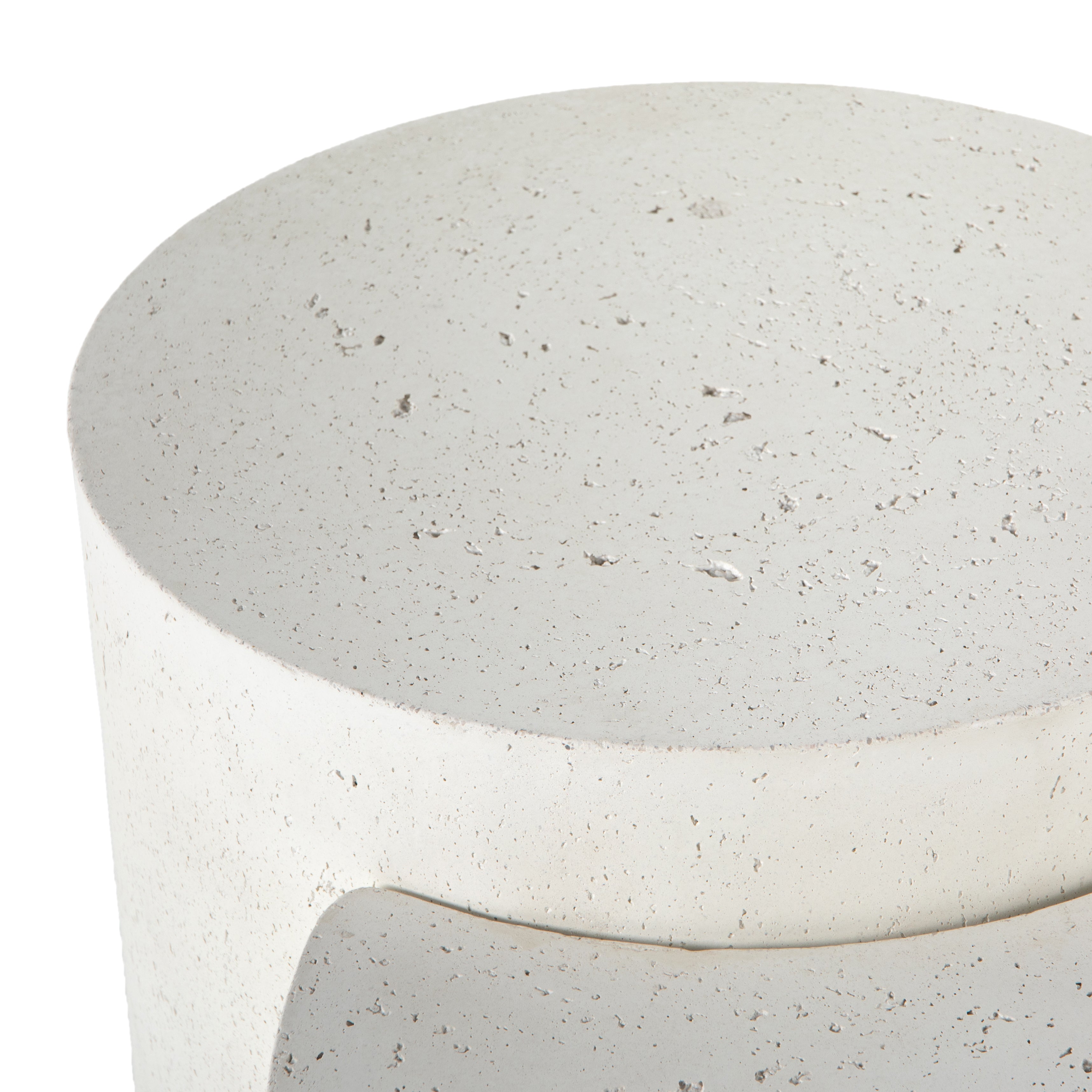 Made from white-finished concrete with deep, textured pitting, this Meza Nesting Coffee Table - Textured White is sturdy and beautiful. Inspired by mid-century coral décor, this nesting coffee table features two tiers for a layered look with modernity.  Overall Dimensions: 43.75"w x 28.25"d x 19.00"h