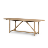 Rustic goes modern with this Mika Dining Table. A triangular stretcher brings architectural interest to this simply styled dining table of white-washed oak.  Overall Dimensions: 84.00"w x 36.00"d x 30.00"h  Colors: Whitewashed Oak Materials: Oak, Oak Veneer