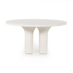 This Parra Dining Table - Plaster Molded Concrete is made from plaster-molded concrete with a cylindrical pillar-style base tapering slightly to support a smooth, white-finished tabletop. We love the texture and brightness this brings to any dining room or kitchen area.   Overall Dimensions: 59.75"w x 59.75"d x 30.00"h
