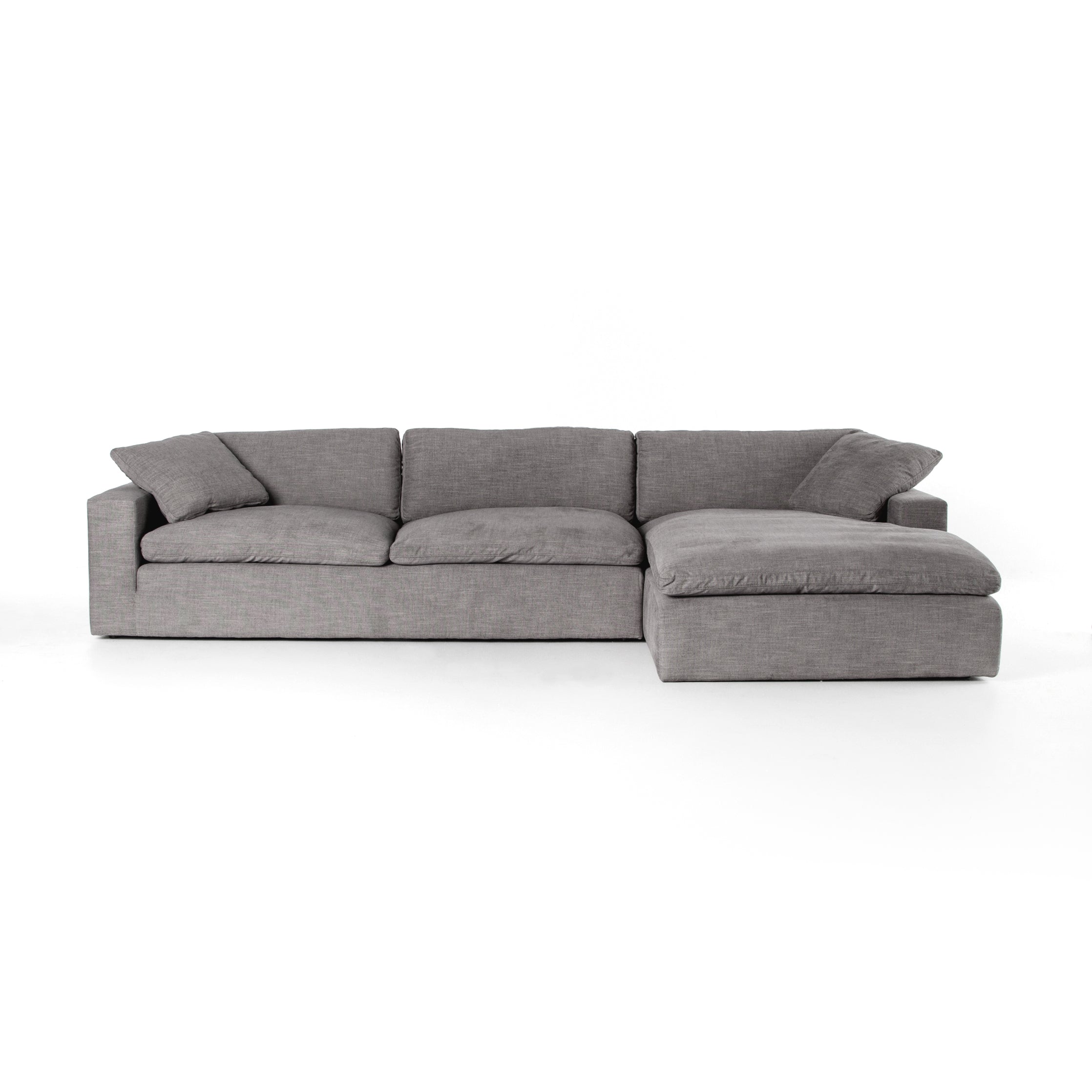 This Plume 2 Piece 136" Sectional - Harbor Grey is oversized and billowy for ultimate comfort, with block arms squaring off sink-in seating and ample feather-and-down cushioning. Perfect for movie nights and gathering the whole family around for years to come.   Overall Dimensions: 136.50"w x 70.00"d x 33.50"h