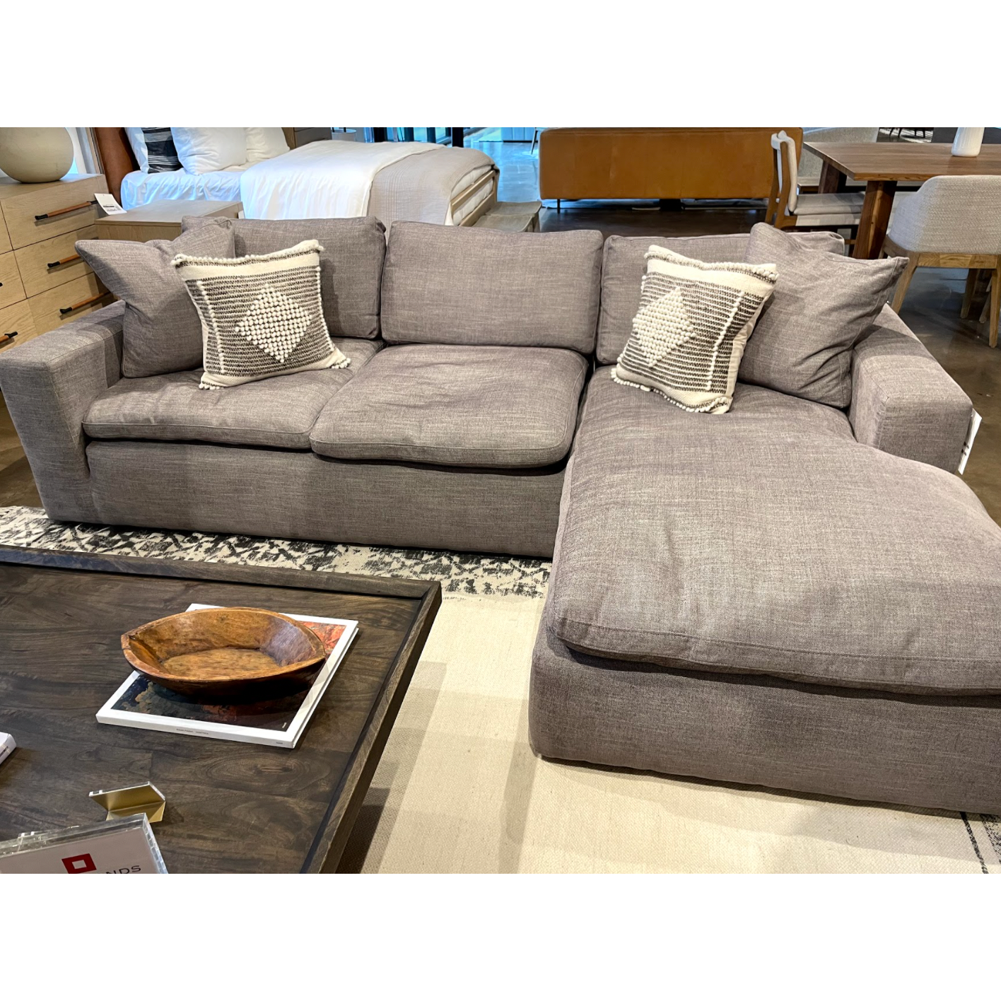 This Plume 2 Piece 136" Sectional - Harbor Grey is oversized and billowy for ultimate comfort, with block arms squaring off sink-in seating and ample feather-and-down cushioning. Perfect for movie nights and gathering the whole family around for years to come.   Overall Dimensions: 136.50"w x 70.00"d x 33.50"h