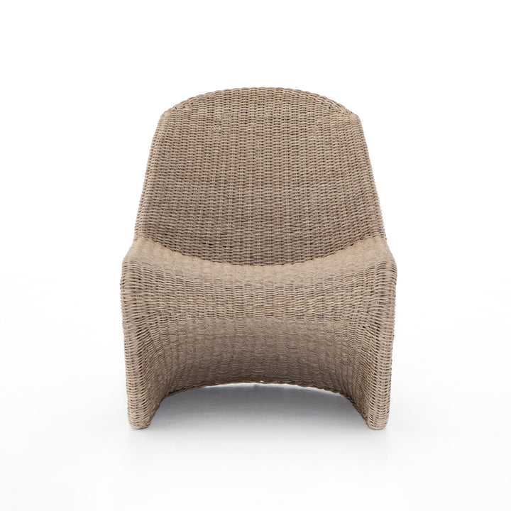 This Portia Outdoor Occasional Chair - Vintage White features a unique shape for comfortable seating. Finished in a vintage white, all-weather wicker makes this the perfect chair for indoors or out.  Cover or store inside during inclement weather and when not in use.  Overall Dimensions: 28.00"w x 33.75"d x 33.50"h