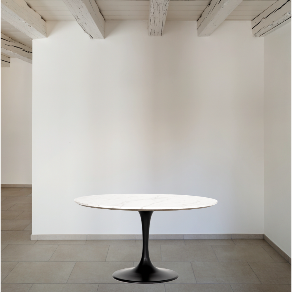 Featuring Powell 55" Dining Table - White Marble by Four Hands at Amethyst Home. We love the mixed materials found in this Powell Dining Table - White Marble. Classic tulip shaping is recast with a rustic black iron base and rounded top of white marble - a perfect addition to any dining room or kitchen! 
Overall Dimensions: 55"W x 55"L x 29.50"H
Colors: Da. Amethyst Home provides interior design, new home construction design consulting, vintage area rugs, and lighting in the Scottsdale metro area.