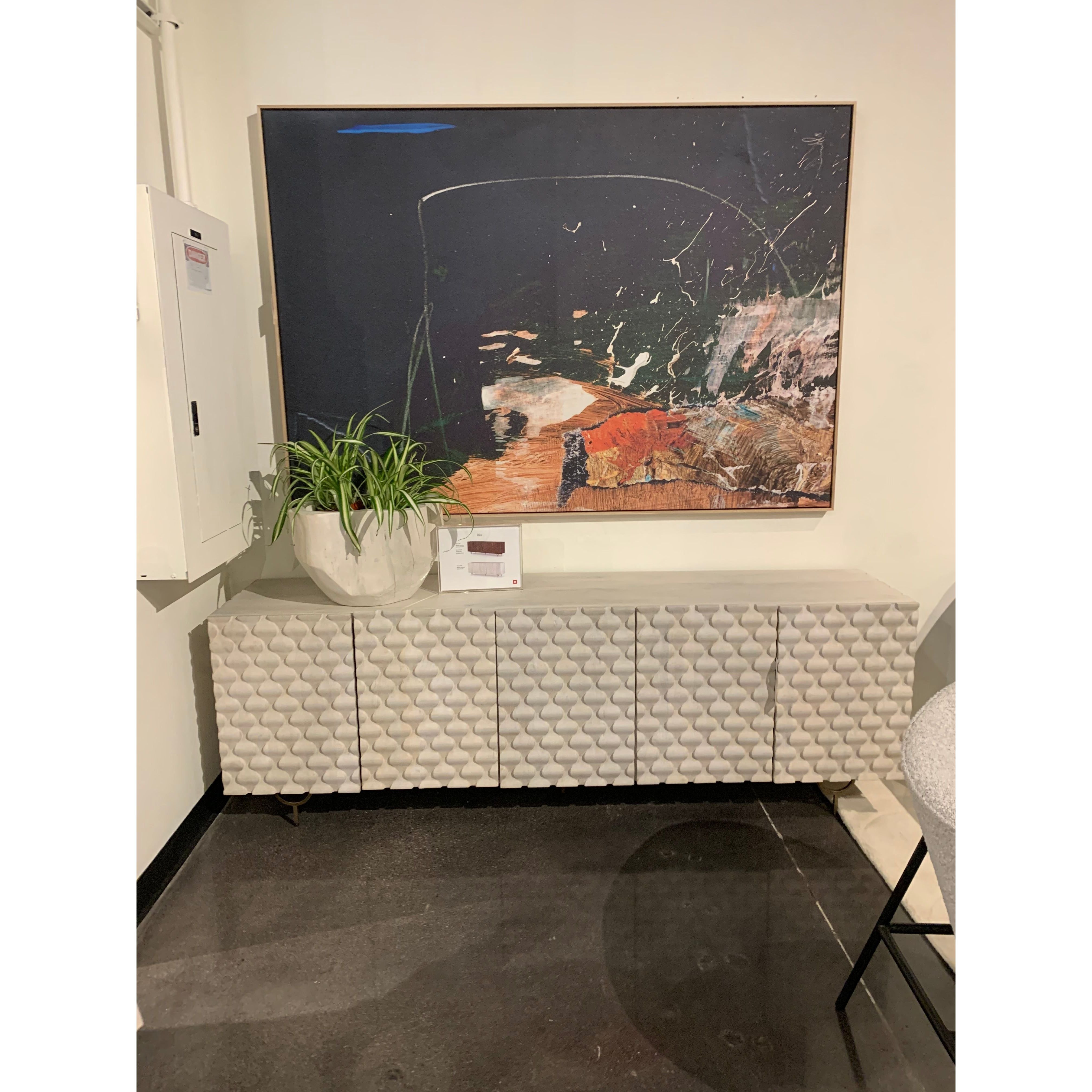 We love the texture of this Rio Media Console - Round Cut White Wash. Made from solid mango with spacious interior shelving and a rear cutout for card management, this is a beautiful piece to add to any living room or entertainment area.   Overall Dimensions: 82.00"w x 18.25"d x 28.00"h