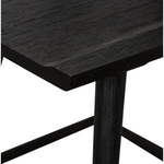A fresh, bar-style take on mid-century Windsor seating is found in this Ripley Bar + Counter Stool - Black Oak. Featuring a bowed, sculptural silhouette and soft black finish to highlight the natural grain of weathered oak.