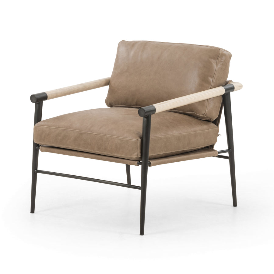We love the slim, black steel frame of this Rowen Chair - Palermo Drift. Buttery, pronounced seating of tan top-grain leather with whitewashed ash accentuating angular arms make this an attractive seating choice for any living room, bedroom, or lounge area.   Overall Dimensions: 27.50"w x 32.00"d x 31.00"h